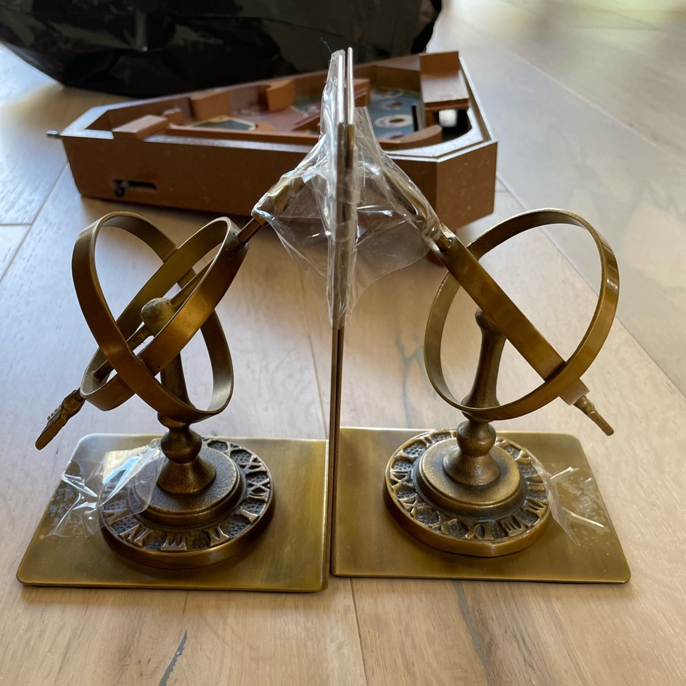 Armiliary brass bookend holder
